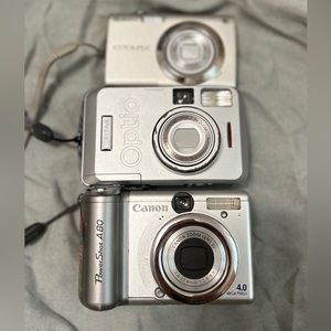 Nikon S4000, Canon A85, Pentax Optio 33LF